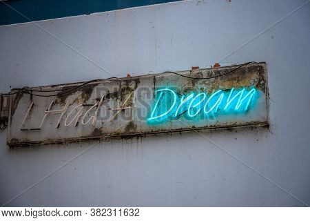 Blue Neon Sign Dream On A Grimy Wall Of London Street
