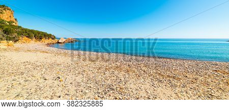 Clear Sky Over Baccu E Praidas Beach In Sardinia, Italy
