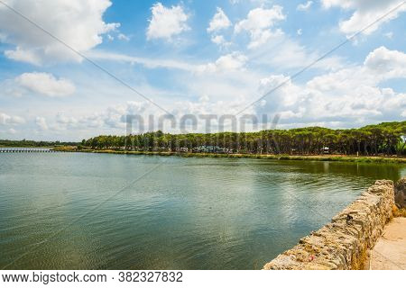 Cloudy Sky Over Calik Lagoon In Sardinia, Italy