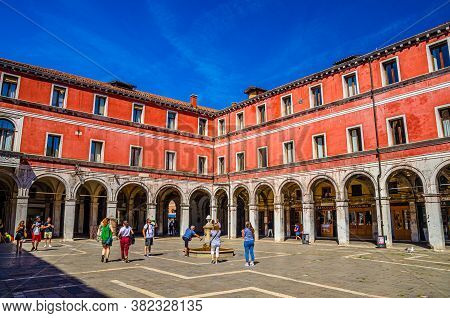 Venice, Italy, September 13, 2019: People Tourists Walking Down Campo San Giacomo Di Rialto Square W