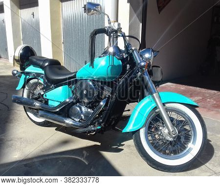 Sardinia, Ita - June 19, 2019: Kawasaki Vn 800 Parked By Garages