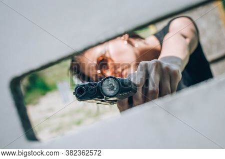 Close-up Abstract View Of Attractive Female Army Soldier With Gun