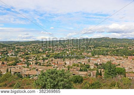 Looking Down On The Town Of Vaison La Romaine, France