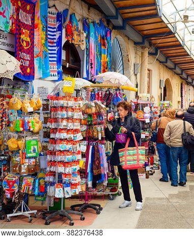 Larnaca, Cyprus - February 16, 2020: Tourist Souvenir Market In Pavilion, People Walking In Row Amon