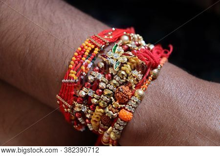 Beautiful Bracelets And Wrist Band On Hand. Friendship Day,