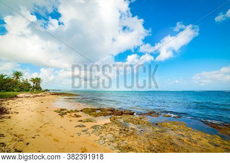 Clouds Over Autre Bord Beach In Le Moule, Guadeloupe. Guadeloupe Is A Archipelago Of French West Ind