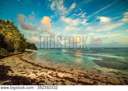 Sunset In Bois Jolan Beach In Guadeloupe, French West Indies. Guadeloupe Is An Archipelago That Is P