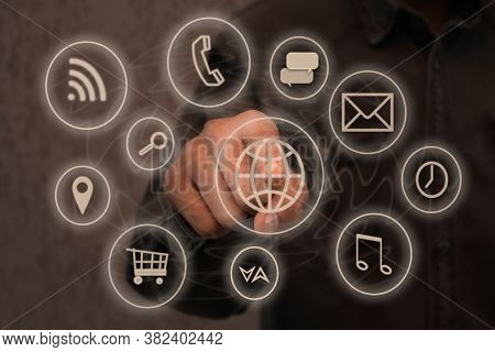 Business Person Clicks The Internet Connection Button. The Concept Of Communication.