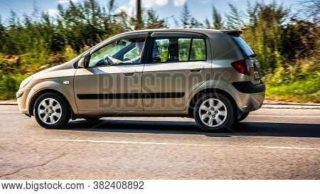 Moscow, Russia - August 16, 2020: Hyundai Getz With Senior Woman Driving On The Country Road. Superm