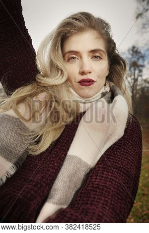 Nice Lady Posing In Autumn Park For Winter Portrait