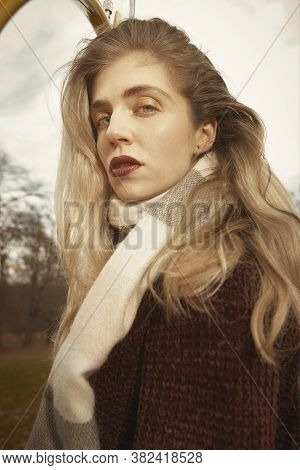 Nice Lady Posing In Autumn Park For Winter Portrait