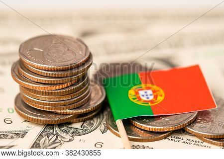 Stack Of Coins With Portural Flag On White Background.