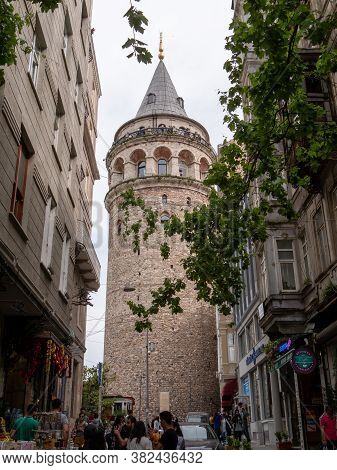 Istanbul, Turkey - May, 22, 2019: Shot Of The Historic Galata Tower From A Laneway In Istanbul