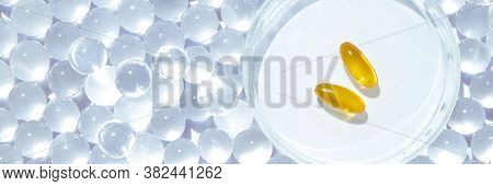 Omega3 Gel Capsules. Yellow Vitamin. Dietology Drug. Fish Oil Supplement. Microdosing Concept. Golde