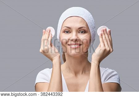 Cosmetology Face Cleaning. Female Beautiful Portrait. White Cotton Pad. Home Facial Routine. Remove 