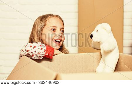 Little Child Open Post Package With Toys. Delivering Happy Moments To Childhood. Insurance Post Pack