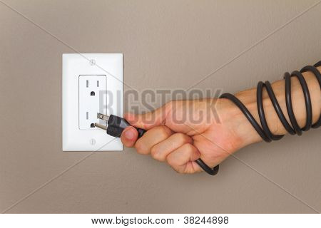 Elektrisk kabel på hånden