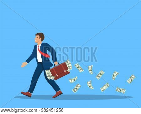 Businessman With A Full Briefcase Of Money In Hand And Cash Fly And Fall Behind. Concept Abundance O