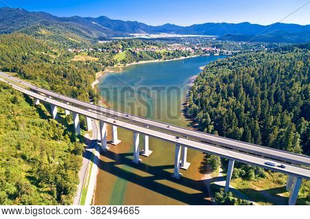 Viaduct Bajer Above Idyllic Lake And Town Of Fuzine Aerial View, Scenic Highway A6 In Gorski Kotar R
