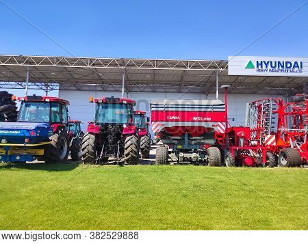 Kyiv, Ukraine - June 16, 2020: Tractor And Unia Cultivator On The Land For Minimum-tillage Technolog