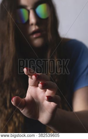Millennial Woman Wearing Halographic Glasses. Augmented Reality Concept.