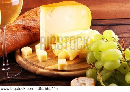 Different Sorts Of Cheese. Cheese Platter With Different Cheese And Spice