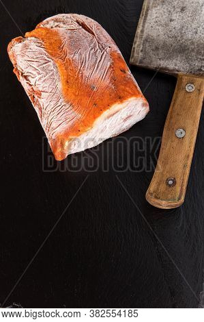Frozen Raw Pork Neck Chops Meat Steak Isolated On Slate. Frozen Uncooked Slices Of Beef Steaks, Tend