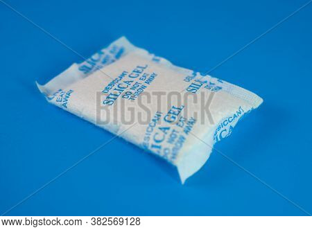 Desiccant Or Silica Gel In White Paper Packaging. Silica Gel