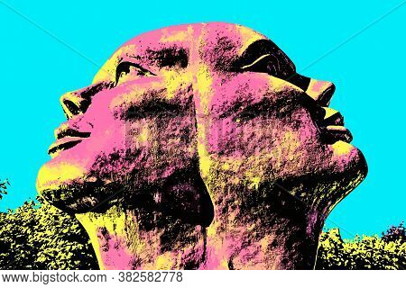 Big Statue Of Two Fused Heads In A Garden Near Damme. A Quiet And Charming Countryside Old Village N