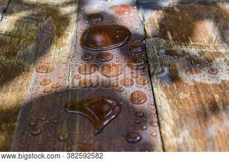 Floor Boards. Rain Drops. Treatments Deck Protect