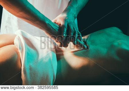 Spa Body, Health And Relaxation Concept, Spa Center. Masseur Doing Massages On Woman Body. Woman Mas