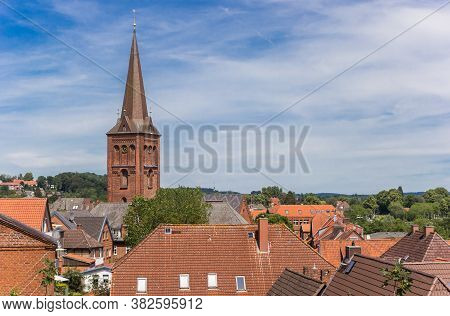 Church Tower And Cityscape Of Plon, Germany