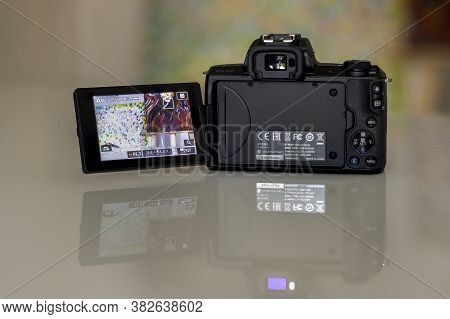 Frankfurt, Germany - 26th August 2020: A German Photographer Takes Pictures Of His Old Canon Eos M50