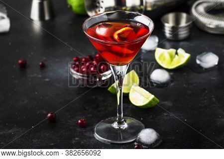 Cosmopolitan Cocktail With Vodka, Liqueur, Cranberry Juice, Lime, Ice And Orange Zest, Gray Bar Coun