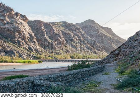 View Of The Fish River At Ai-ais. A Weir Is Visible