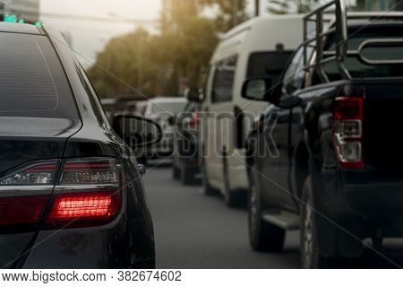 Turn Light Of Car On Asphalt Road. Traffic Jams In The Evening With Other Cars.