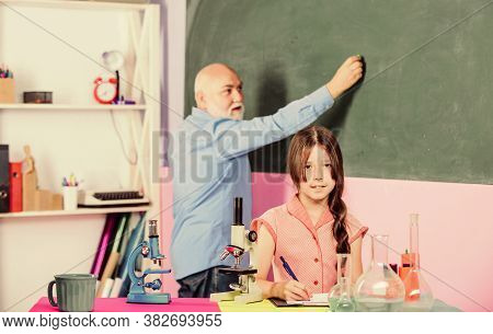 Expand Your Mind. School Lesson. Good Pedagogue Friendly Kind. Little Girl With Man Tutor Study Scie