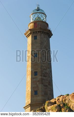 Lighthouse Vilan On A Sunny Day In The Fishing Village Of Camariñas, Galicia, Spain