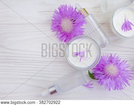 Cream Cosmetic Flower On Wooden Background Echinacea