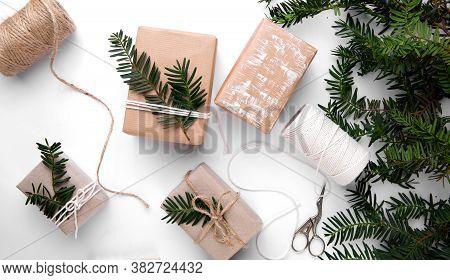Hand Made Gifts For Christmas On White Table
