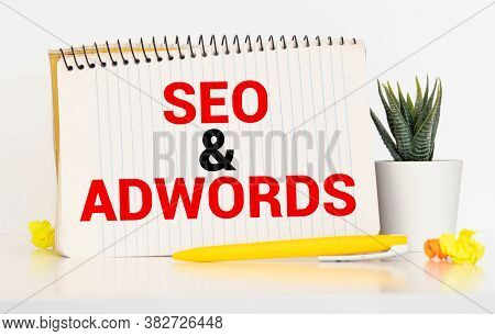 Word Writing Text Seo And Adwords. Business Concept For Pay Per Click Digital Marketing Google Adsen