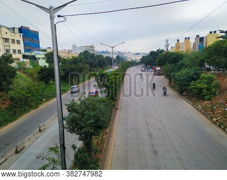 Beautiful View Of Laggere Ring Road From The Bridge With Cityscape And Sky Background