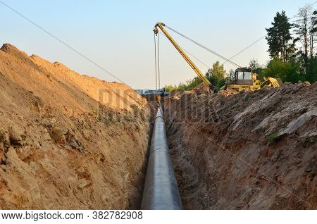 Natural Gas Pipeline Construction Work. A Dug Trench In The Ground For The Installation And Installa