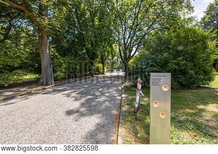 Sittard, South Limburg / Netherlands. August 4, 2020. Country Road With An Information Post Between 