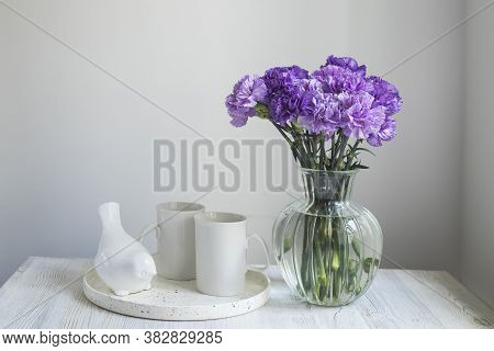 Bridal Bouquets Of Lilac Carnations In A Four Round Glass Vases Different Sizes As Table Decoration