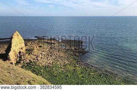 Giant Blade Rock At Pointe Du Hoc On The English Channel In Normandy.