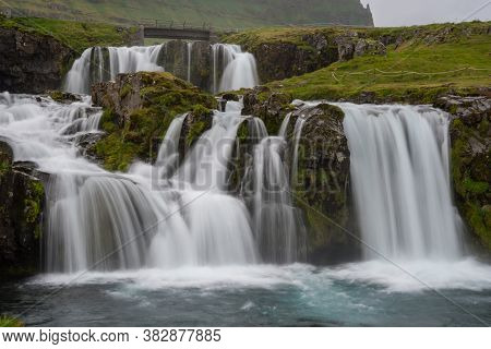Kirkjufellsfoss Waterfall In Snaefellsnes Peninsula In Iceland