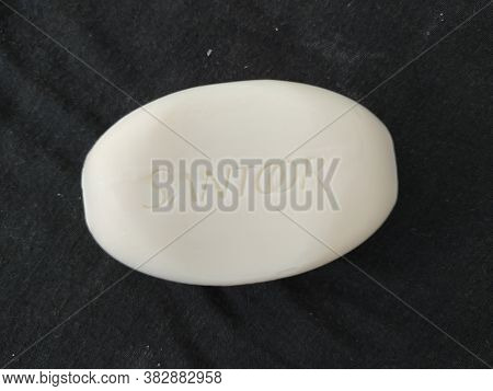 Closeup Of Pack Opened And Closed White Color Santoor Sandal And Almond Milk Soap Bar Isolated On Bl