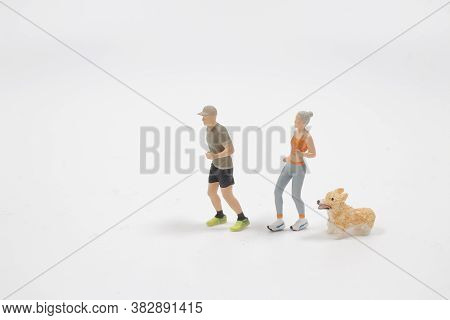 A Mini People : Couple Running On White Background