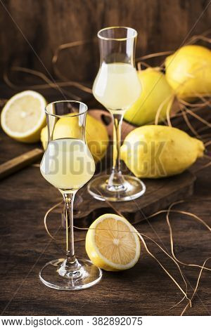 Limoncello, Sour Sweet Italian Lemon Liqueur, Traditional Strong Alcoholic Drink. Copy Space, Select